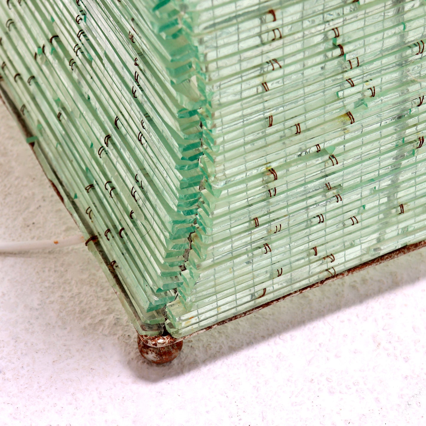 Sculptural floor lamp with wired glass construction
