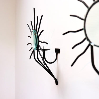 Sunburst wall sconces in the style of Andre Dubreuil