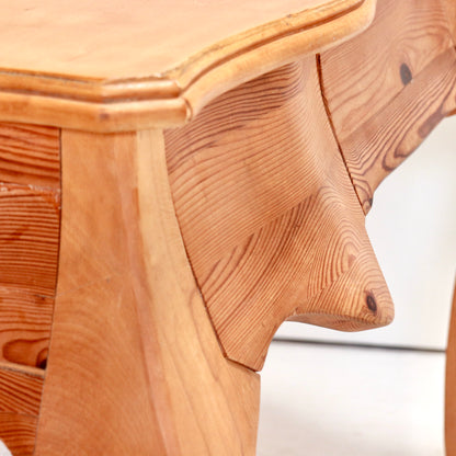 Detail of mixed wood grain on sculptural desk apron