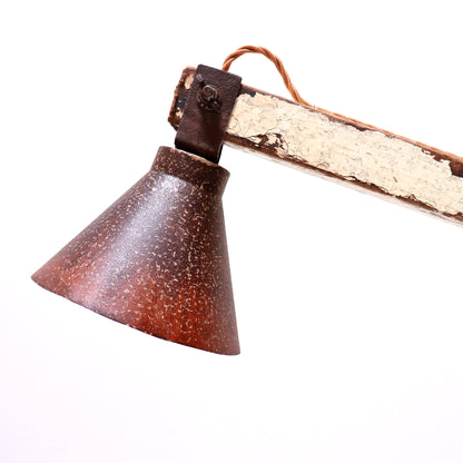 Close-up of patinated metal lampshade