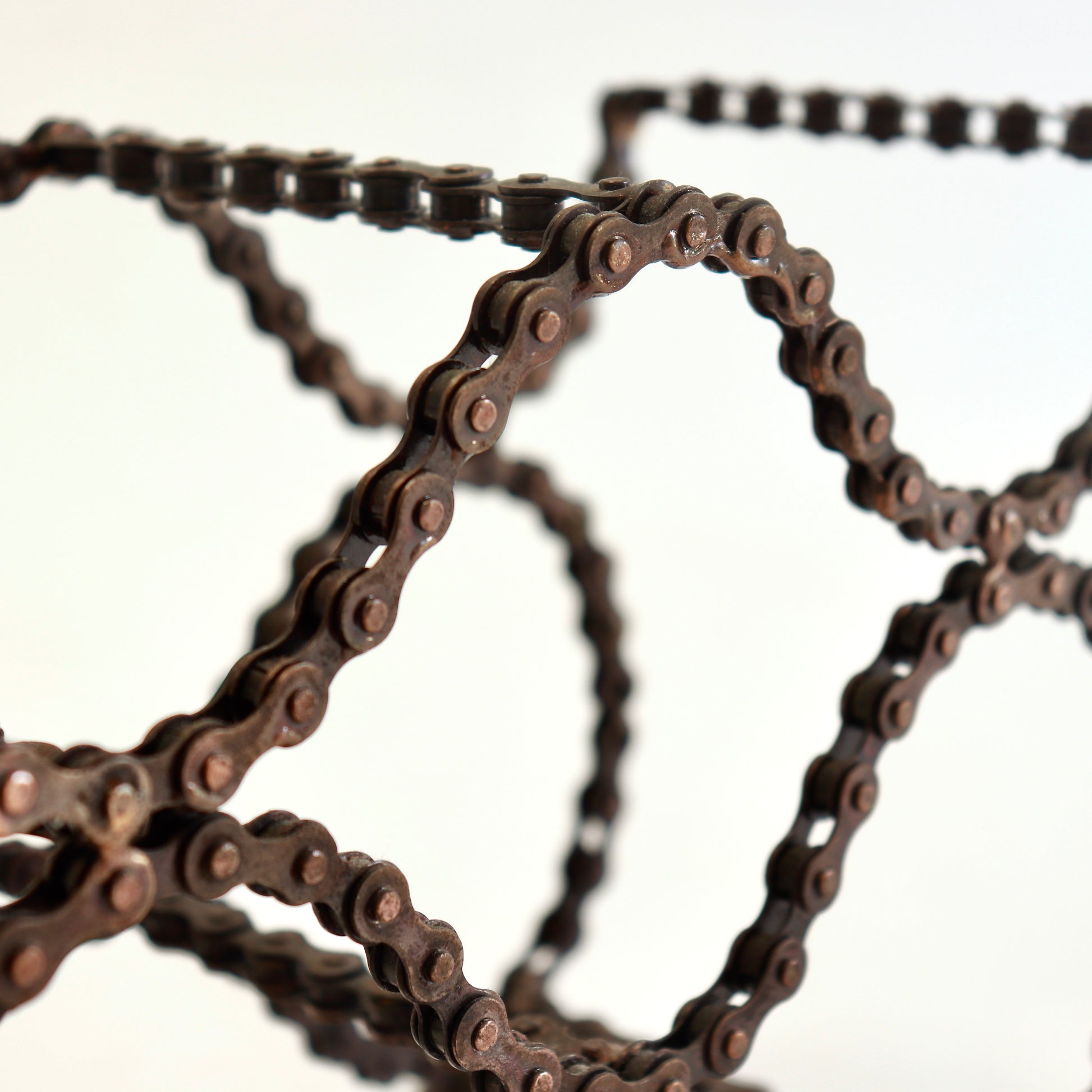 Artisan wine rack made from recycled bicycle components