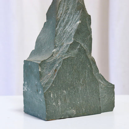 Detail of raw carved slate surface on lamp base
