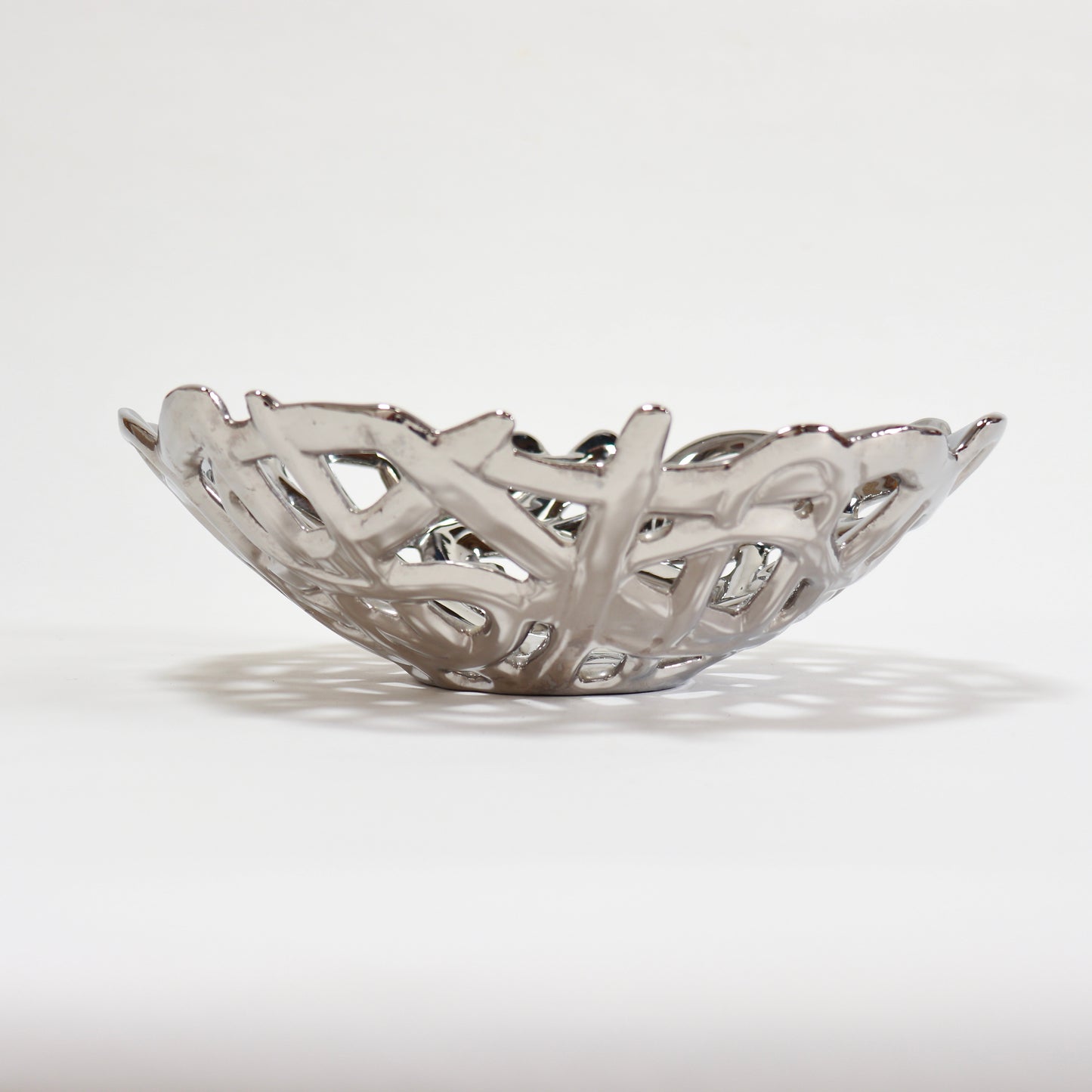 Decorative chrome-glazed ceramic centrepiece