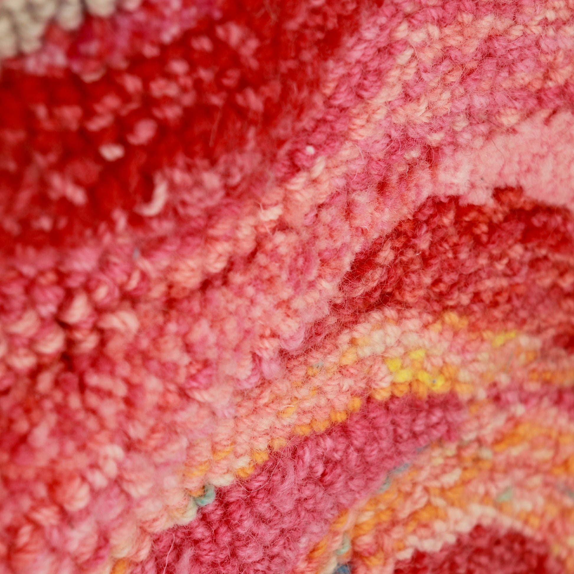 Hand-dyed wool textile with spiral floral motif