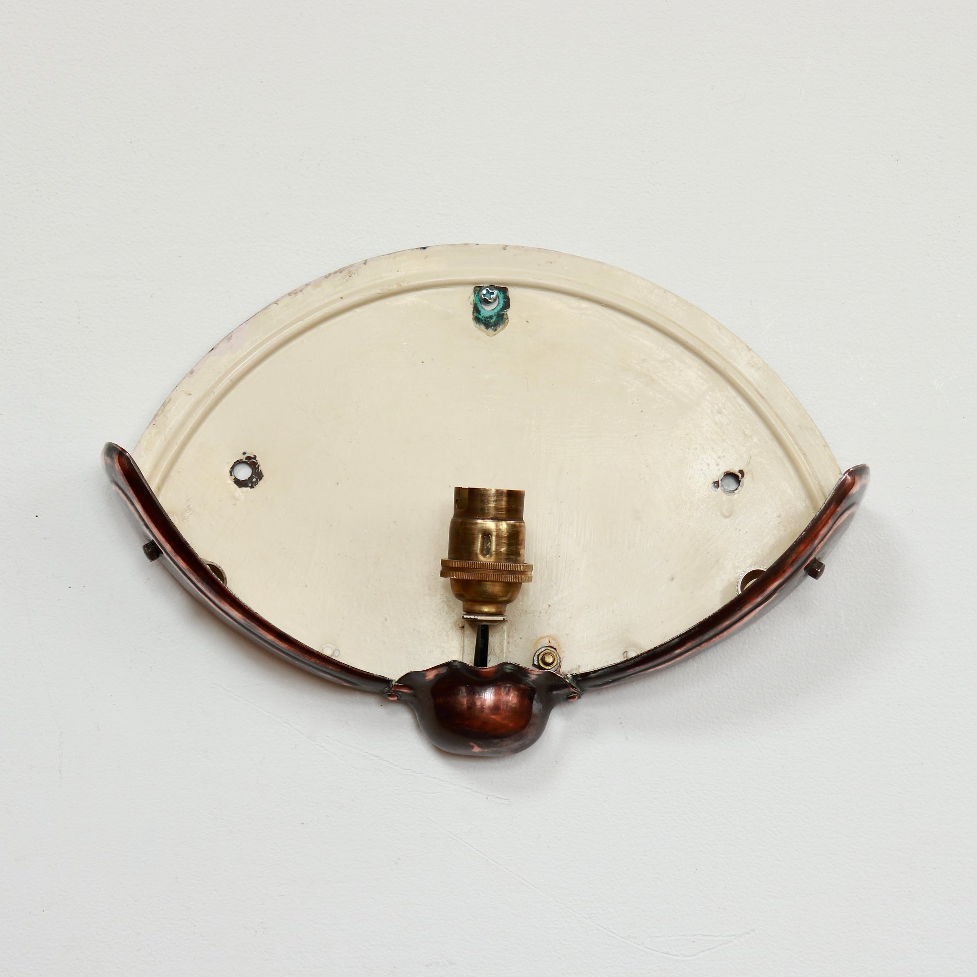 Copper mounted clam shell wall sconce