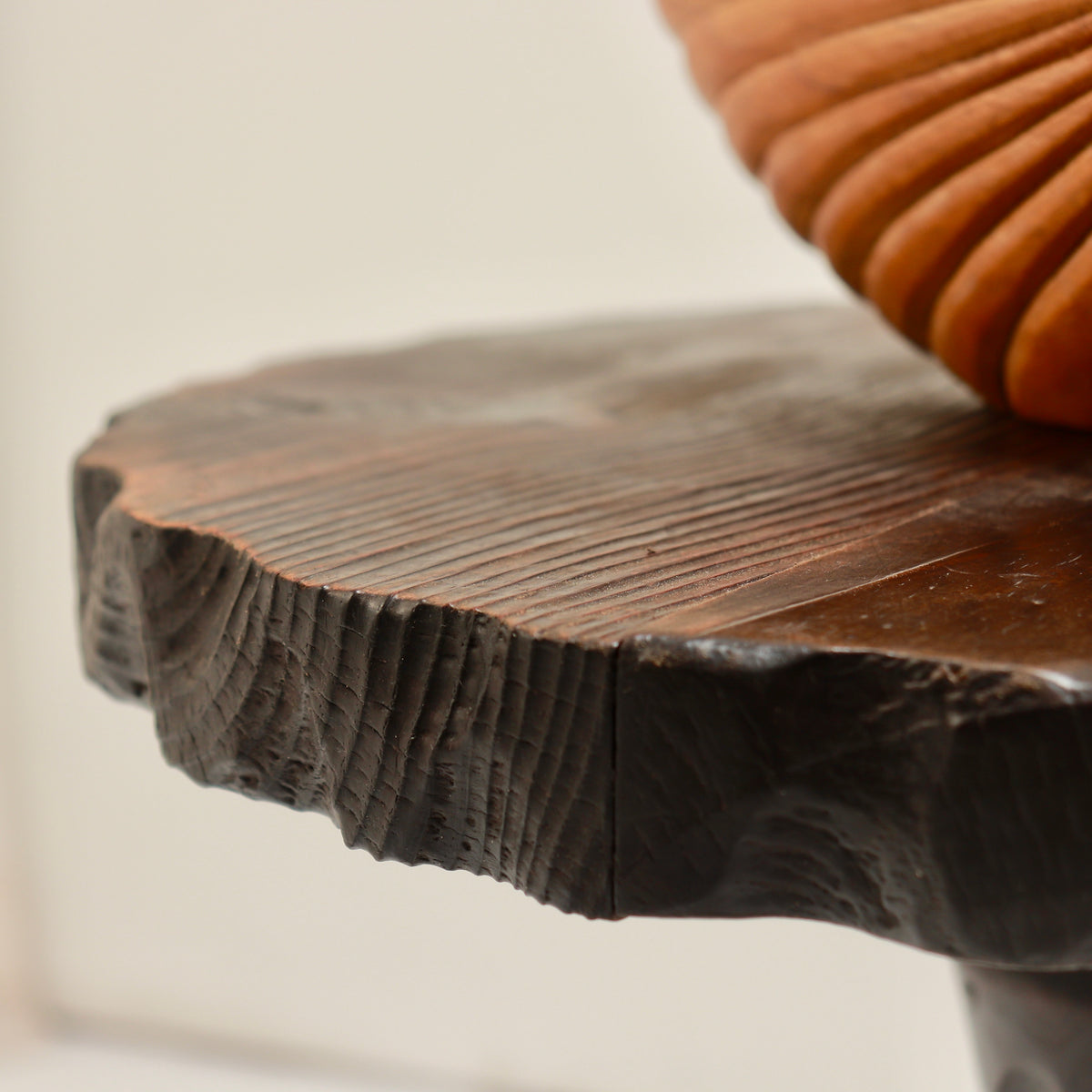 Close-up of the roughly carved edge and visible tool marks
