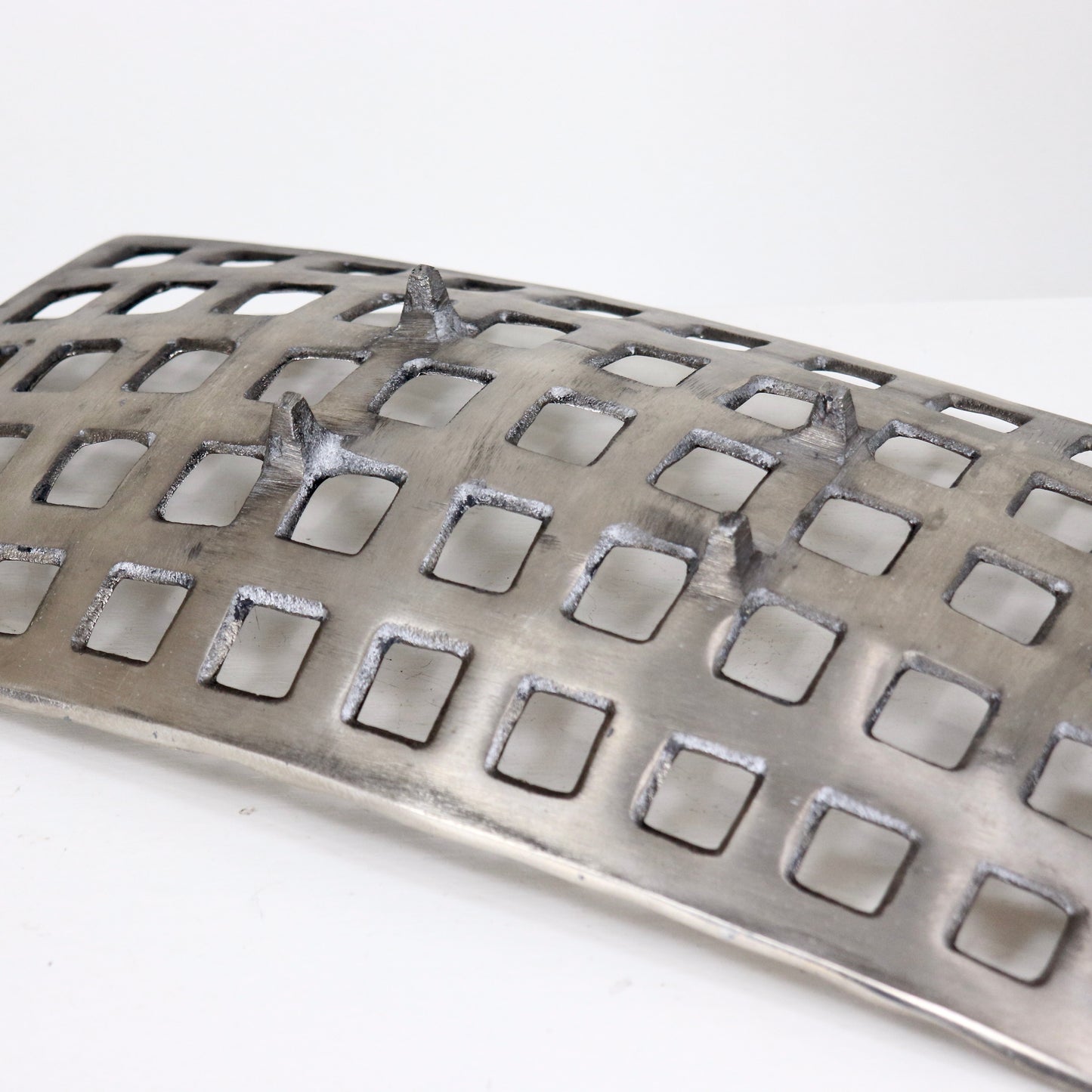 Underside detail showing feet on cast aluminium fruit basket