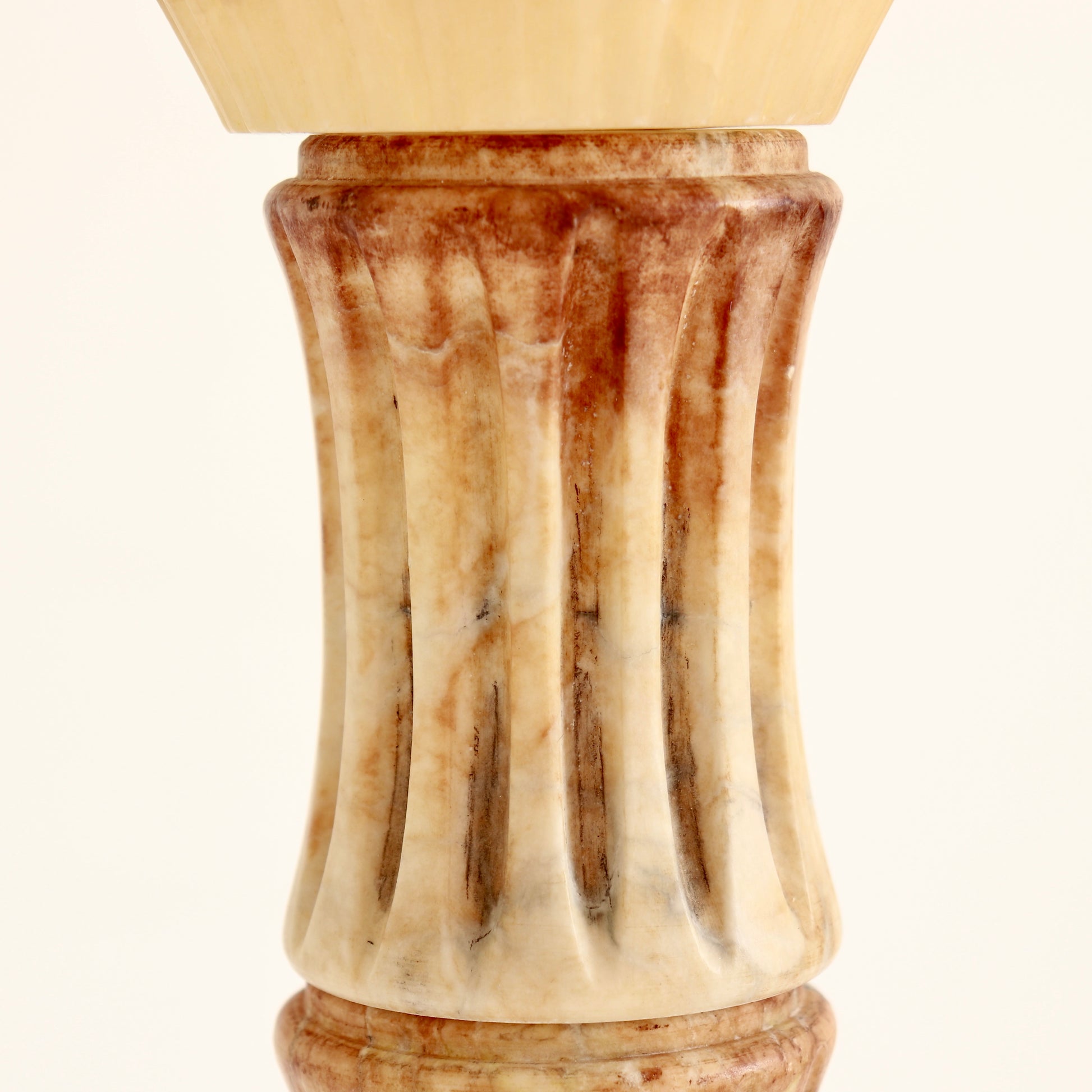 Detail of carved fluted alabaster column.