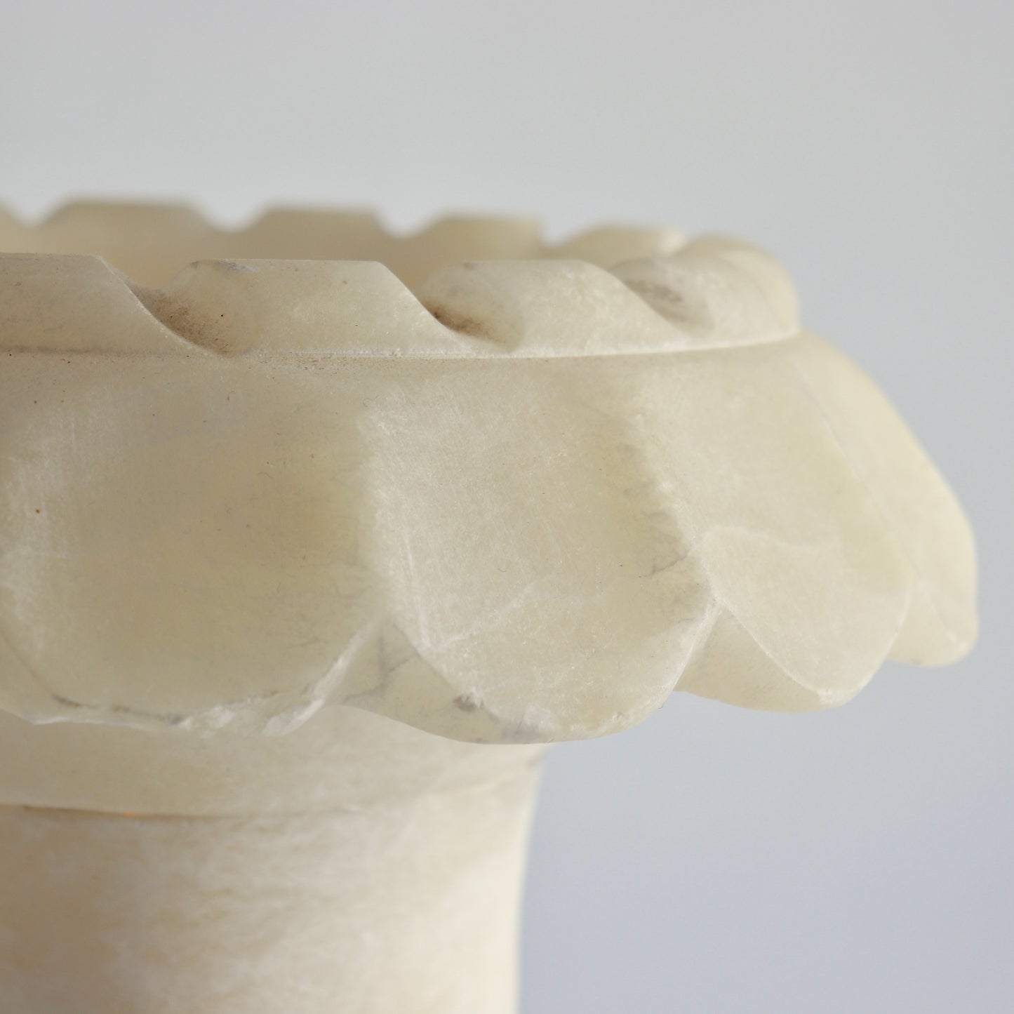 Detail of fluted rim on alabaster table lamp