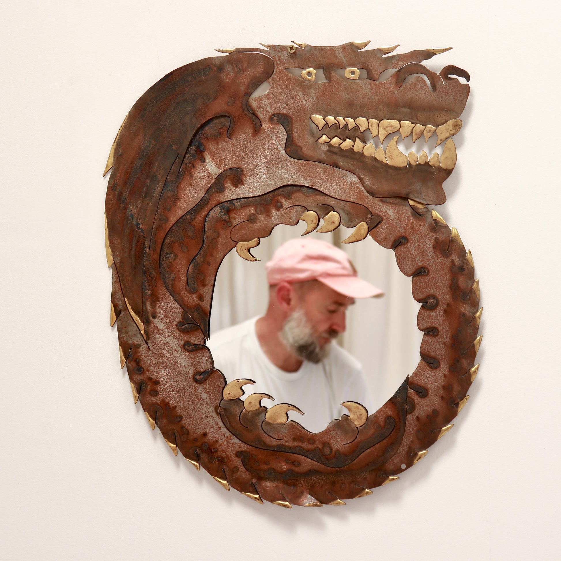 Folk art steel dragon mirror with layered metal construction