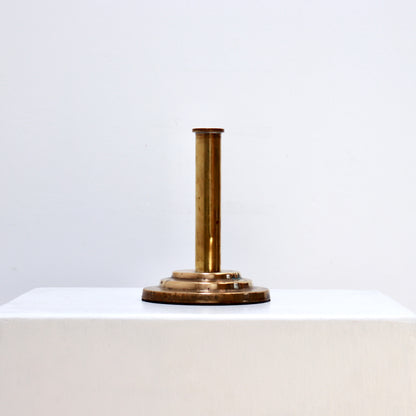 Minimalist brass bud vase with stepped base