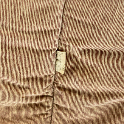 “Roset maker’s label on side seam of Ligne Roset Brigantin armchair.”