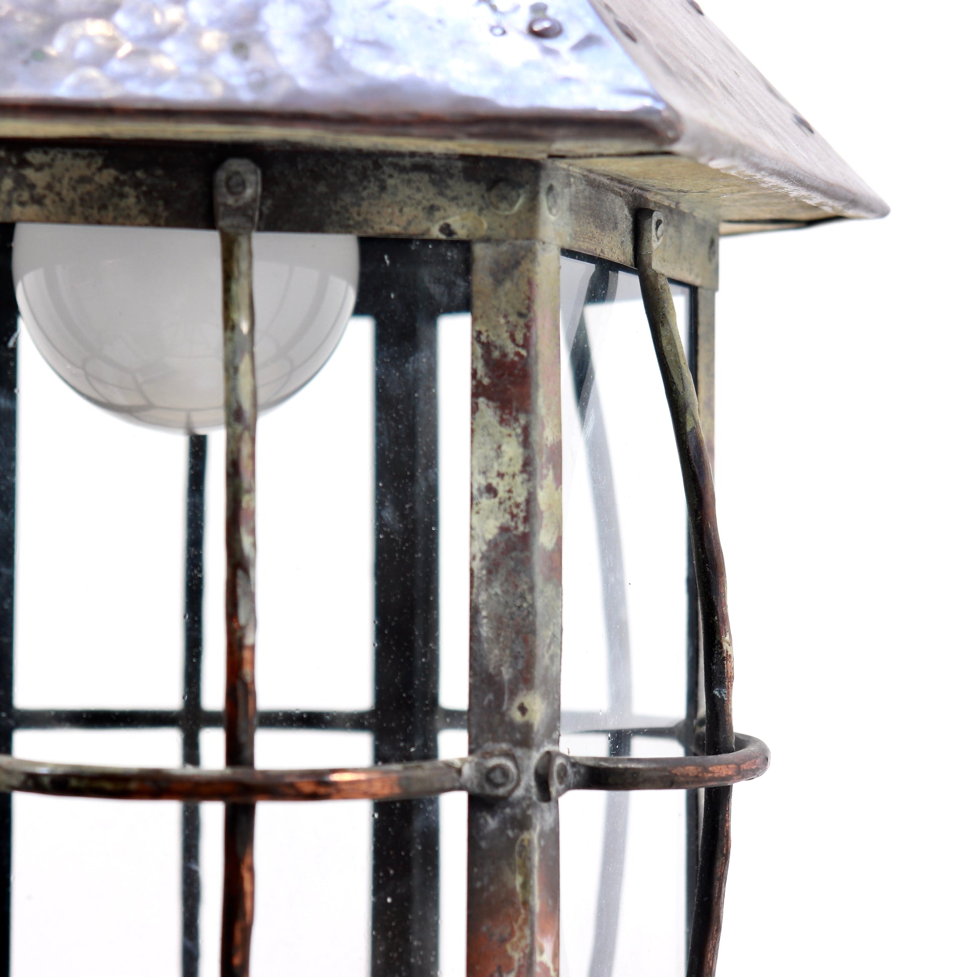 Detail of hammered copper canopy with rivets