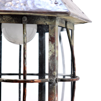 Detail of hammered copper canopy with rivets