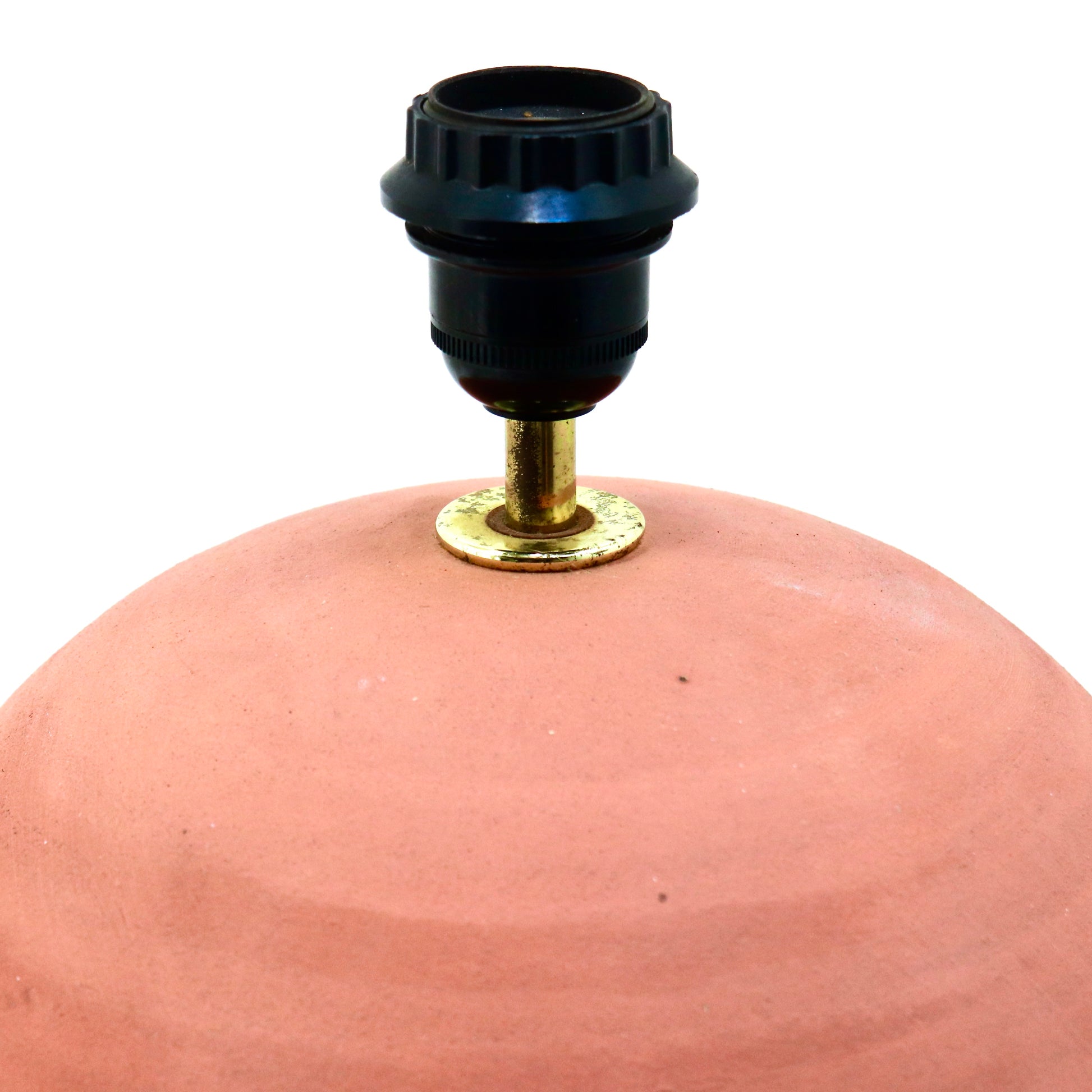 Vintage clay lamp showing brass fitting and socket