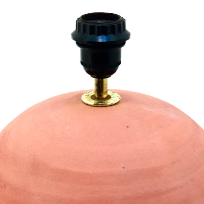 Vintage clay lamp showing brass fitting and socket