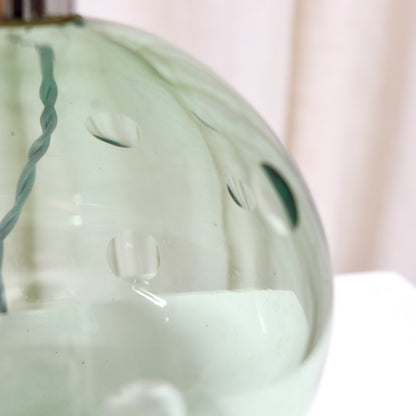 Hand cut lens details on vintage French green glass lamp
