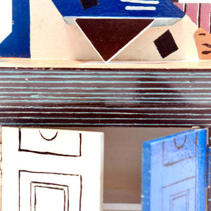 1. Detail of enamel paintwork and geometric shapes above the cupboard