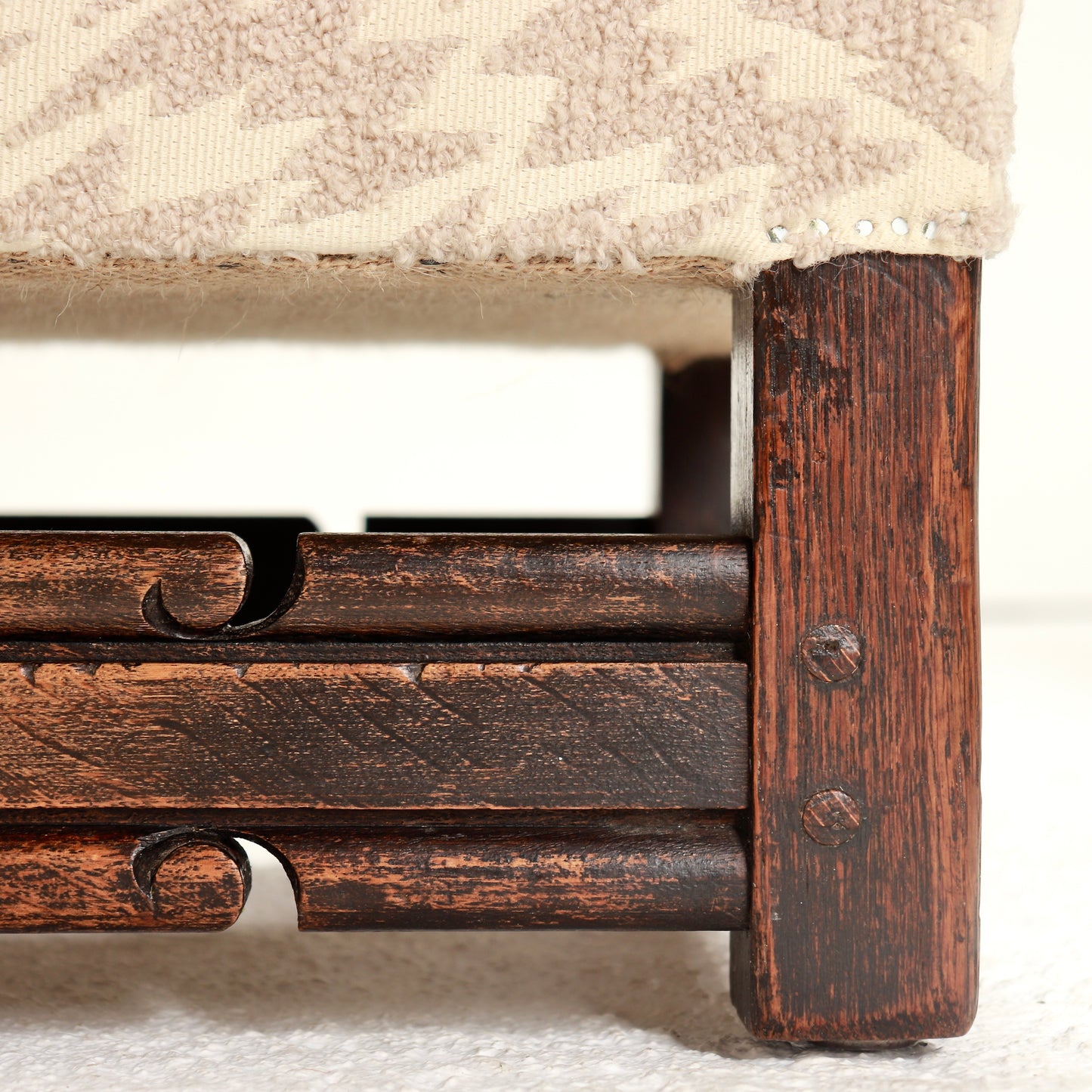 Early 20th century oak footstool with carved stretcher rails