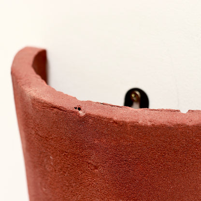 Detail of textured clay surface and patina