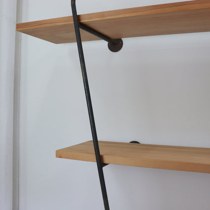 Side view showing iron bracket and timber shelf thickness.