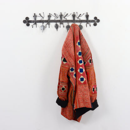 Sculptural iron hallway coat rack
