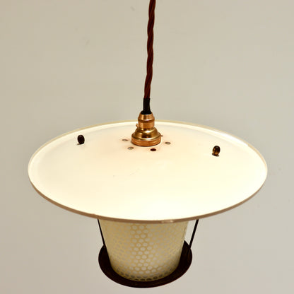 View from above showing the cream enamel canopy, brass fitting, ventilation holes and braided flex.
