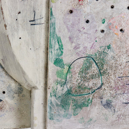 Detail of drilled holes, pigments and incised lines on sculpture