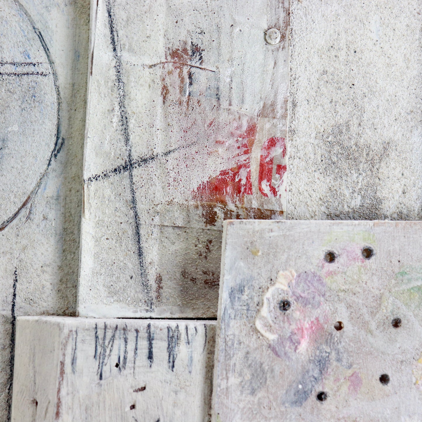 Close-up of carved relief elements and patina