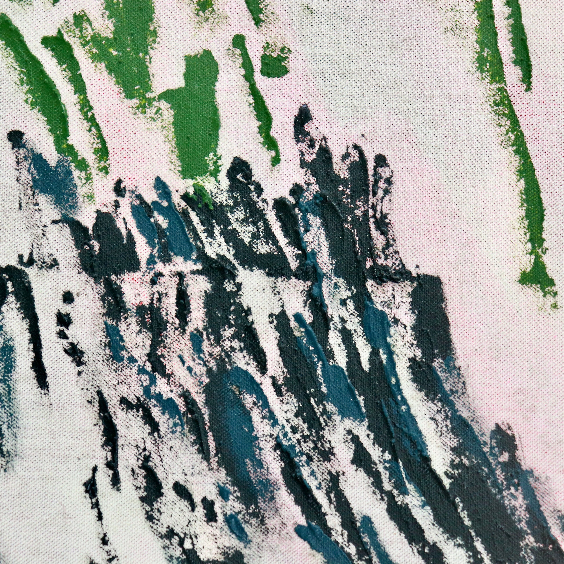 Close-up of oil paint texture on unprimed raw canvas weave