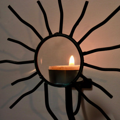 Sunburst wall sconces in the style of Andre Dubreuil