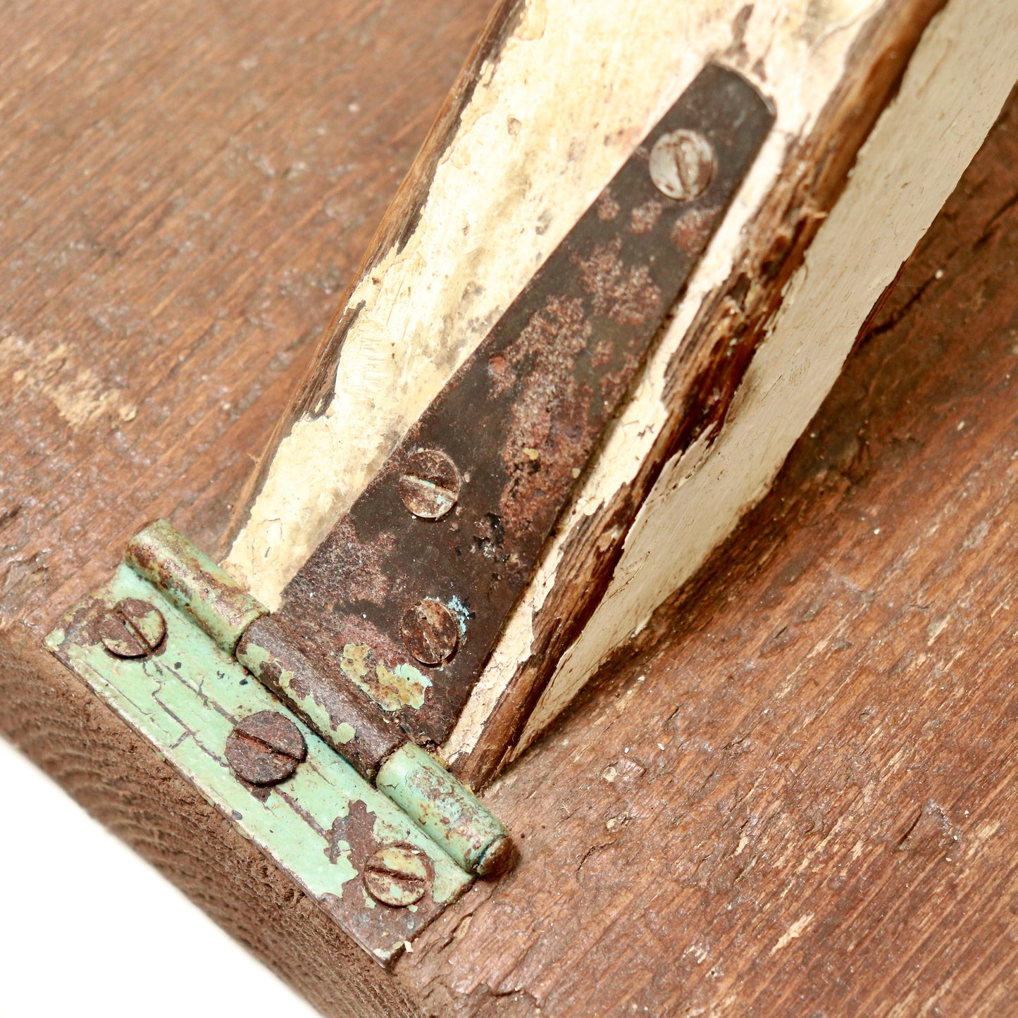 Base and hinge detail on rustic wooden lamp