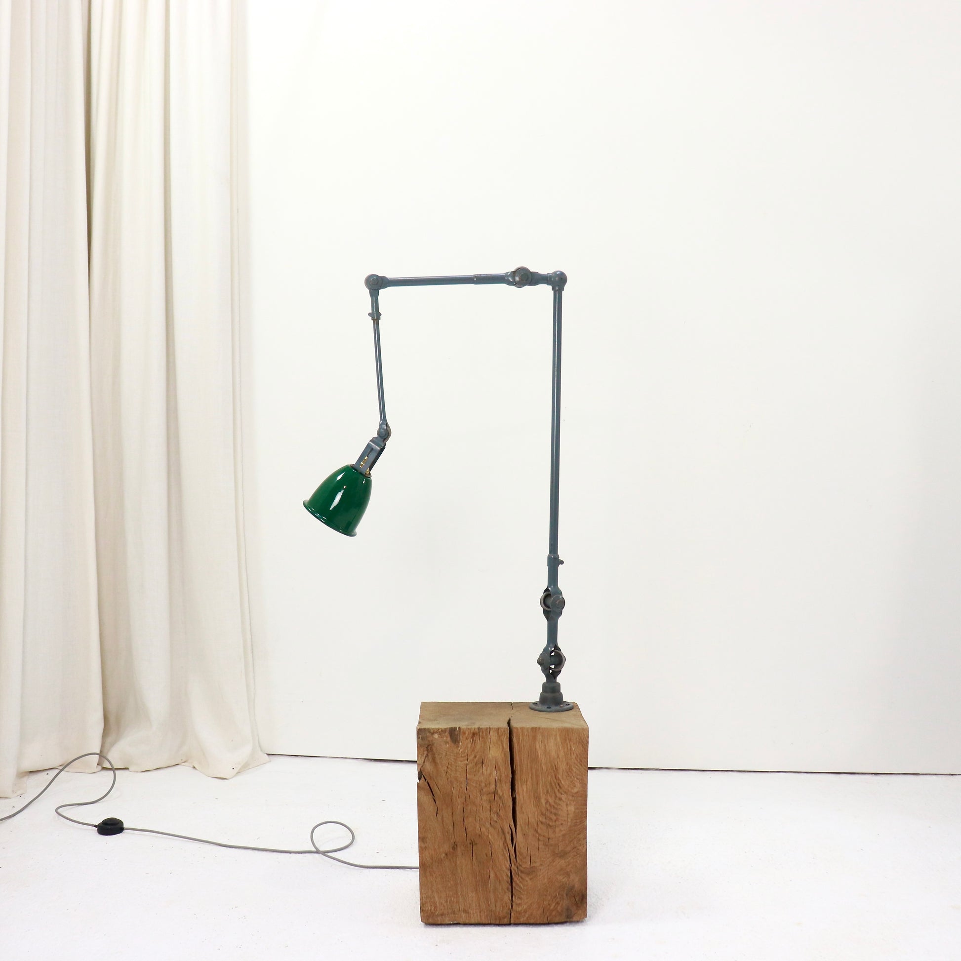 Industrial task light transformed into sculptural floor lamp