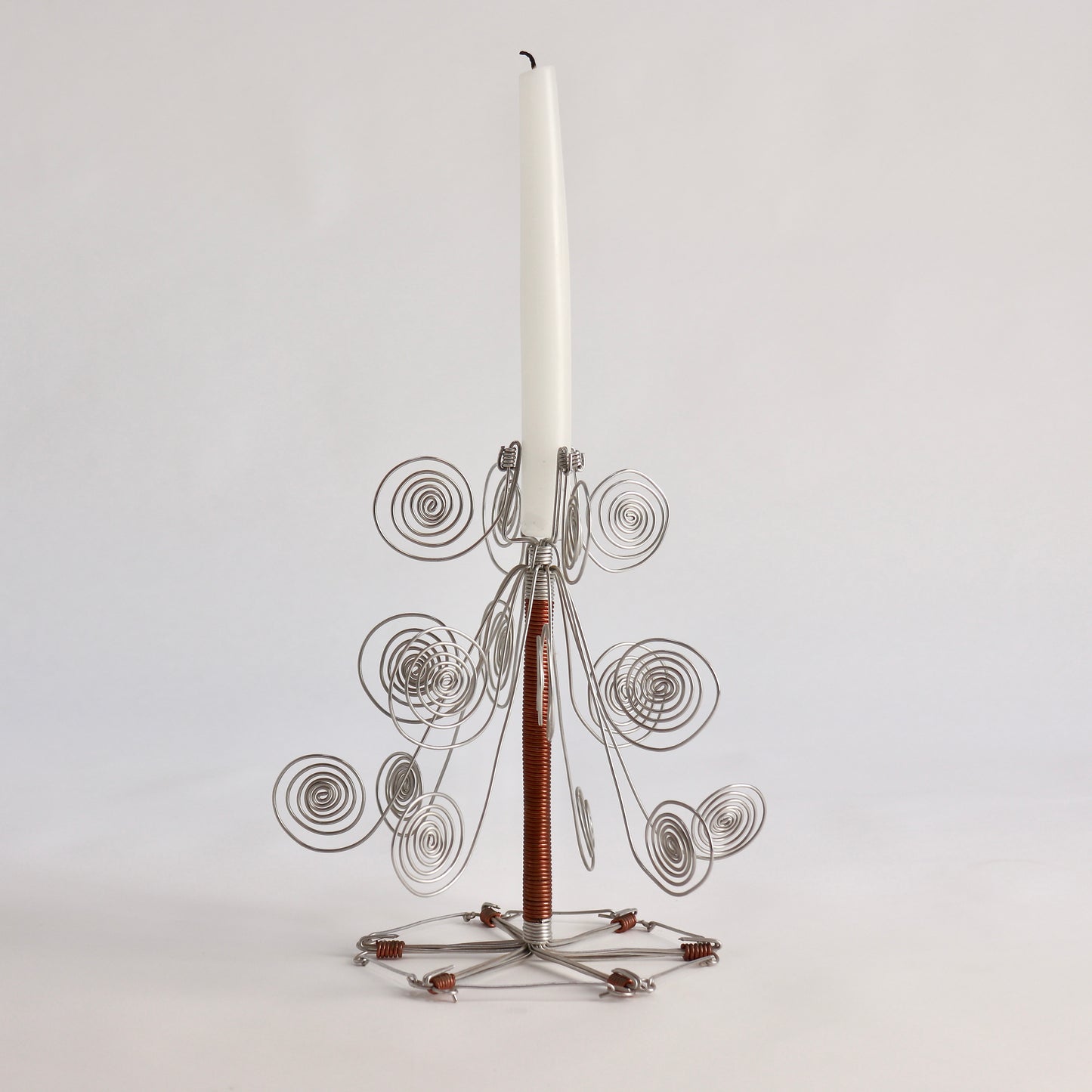 Handmade wire spiral candle holder with taper candle