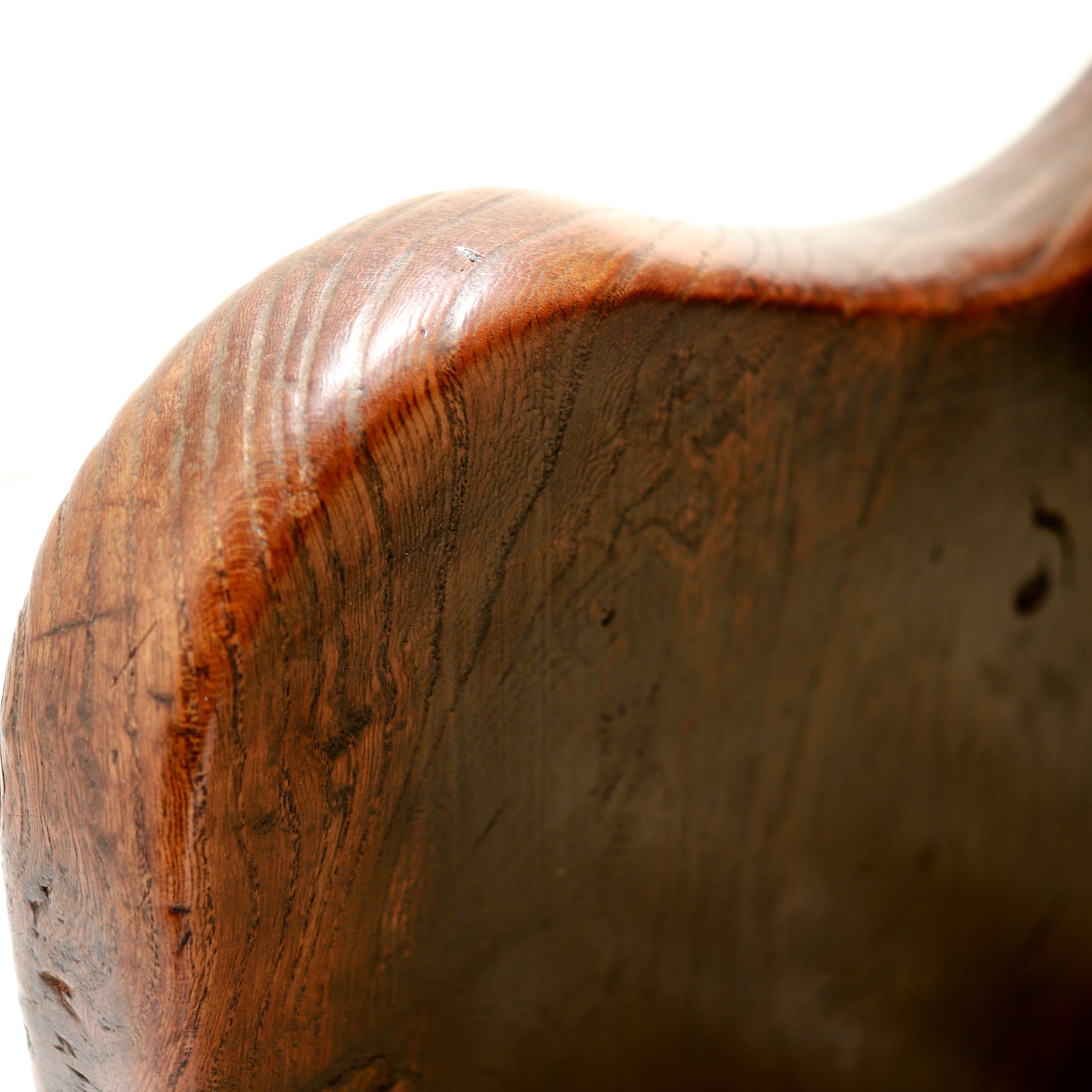 Close-up of aged chestnut timber grain and patina