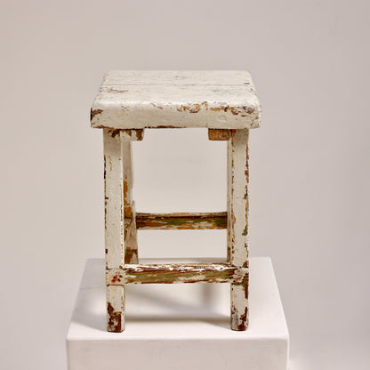 Rustic folk art stool with square top and stretcher base