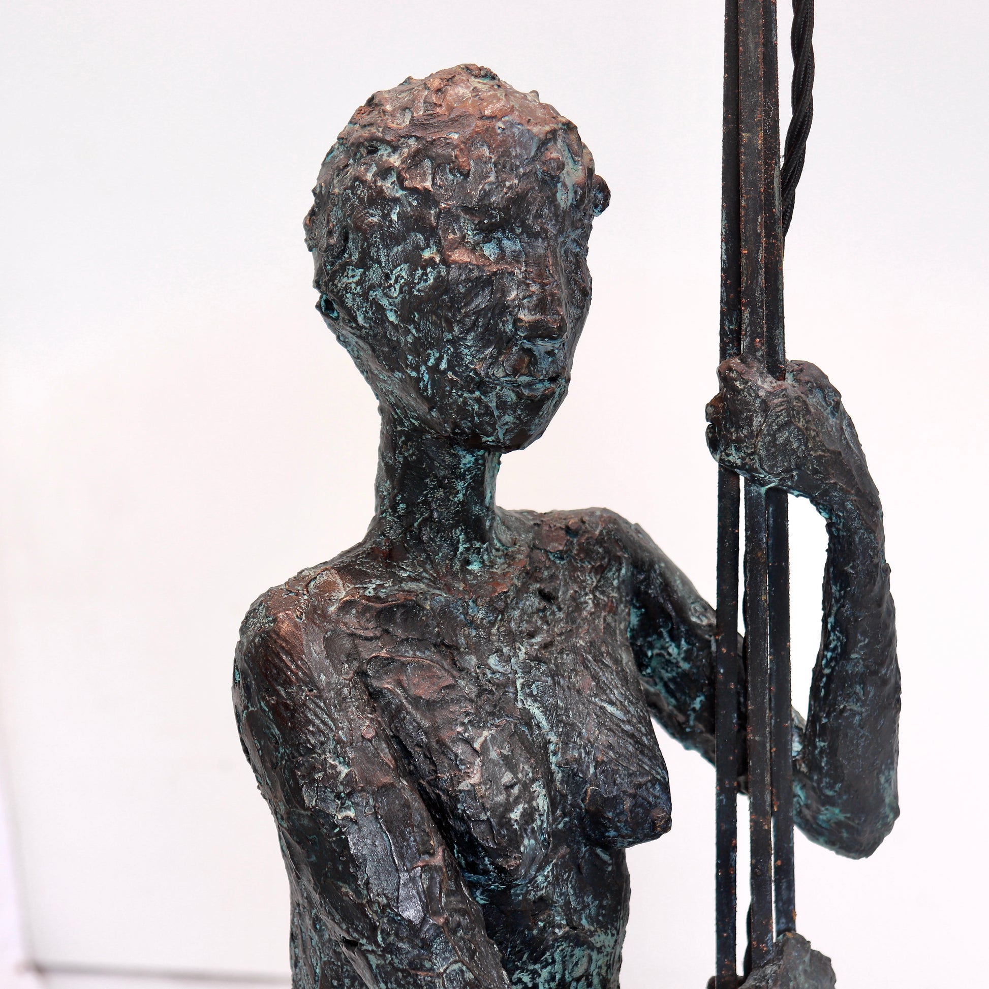 Figural lamp base and sculptural detailing
