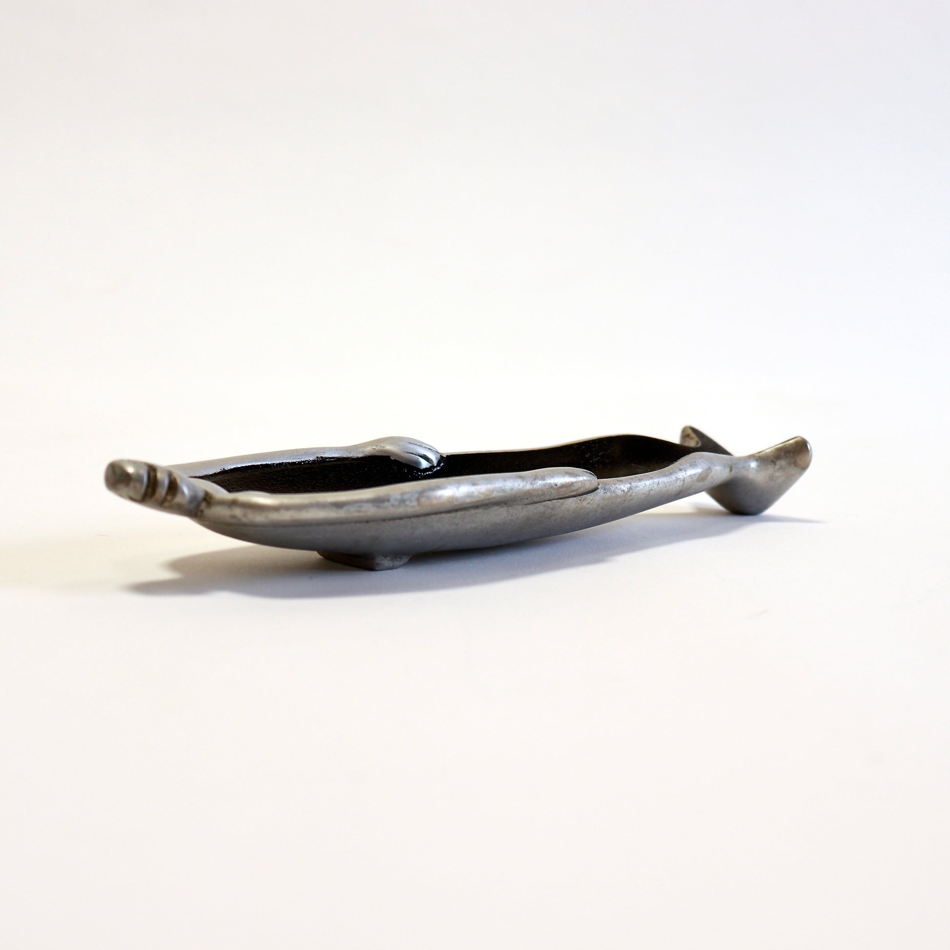 modernist pewter object