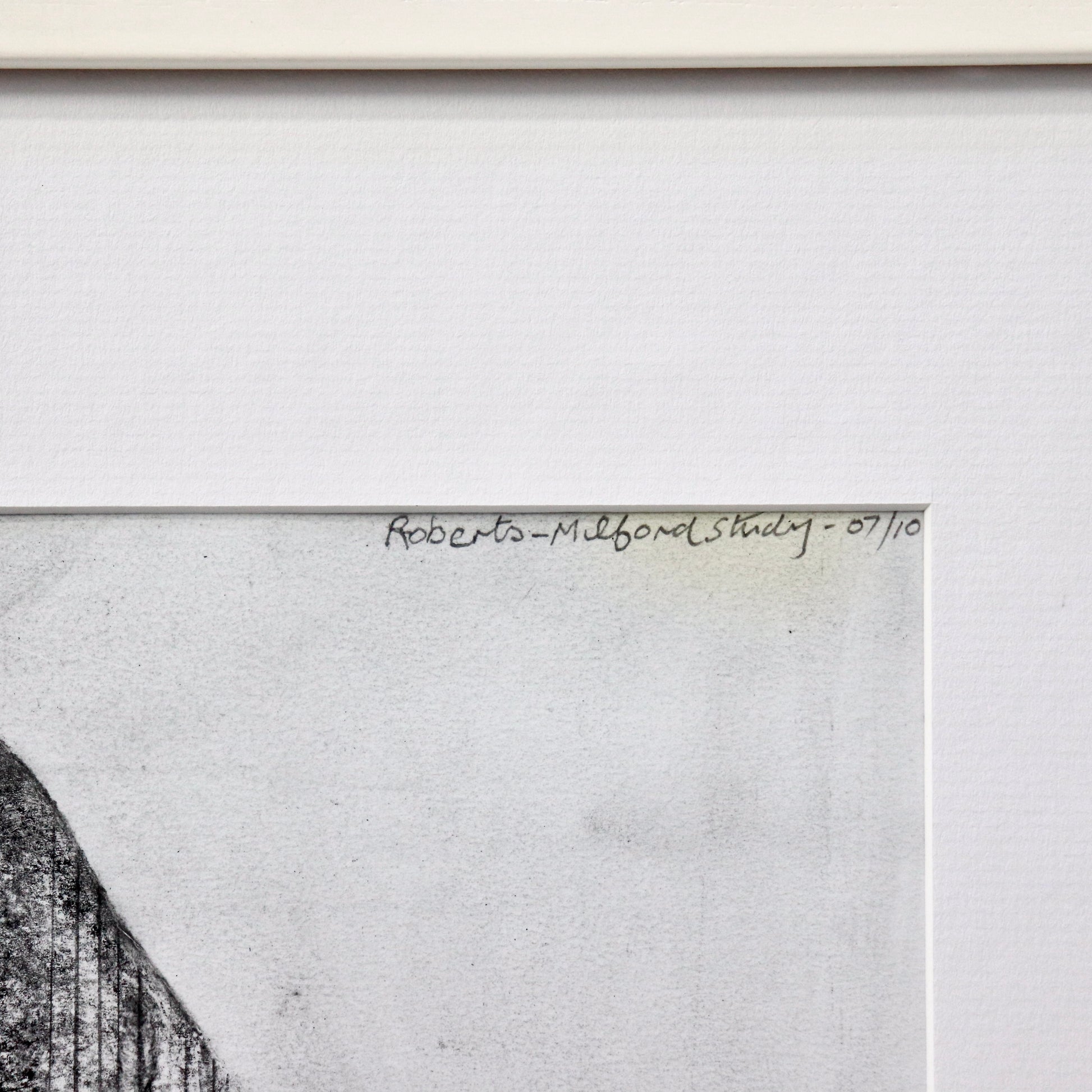 Signature and edition detail on charcoal drawing