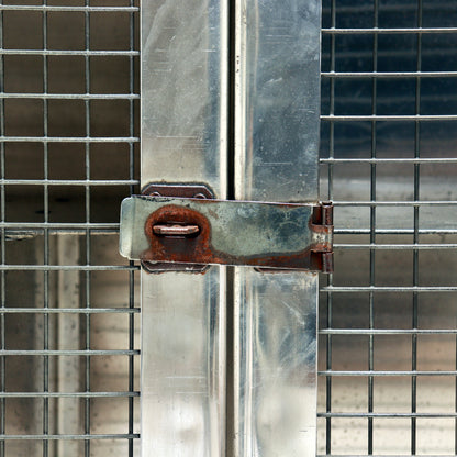 Original steel latch detail with aged patina.