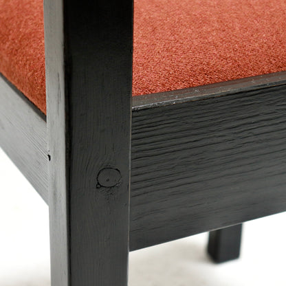 “Grain detail on ebonised pine frame of Danish chair”