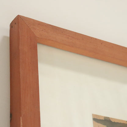 Corner of simple timber frame holding Carole McDowall’s 1995 artwork.