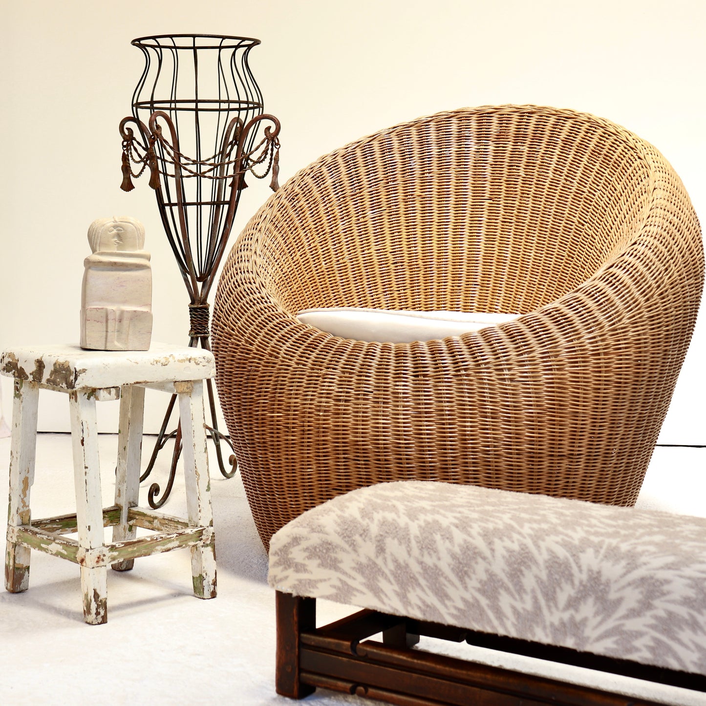 Vintage rattan lounge chair styled in minimal interior