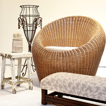 Vintage rattan lounge chair styled in minimal interior
