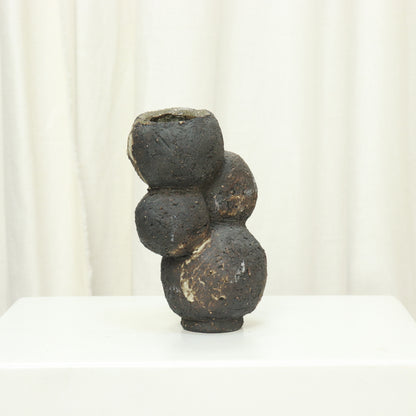 Sculptural hand-built ceramic vase with volcanic clay texture