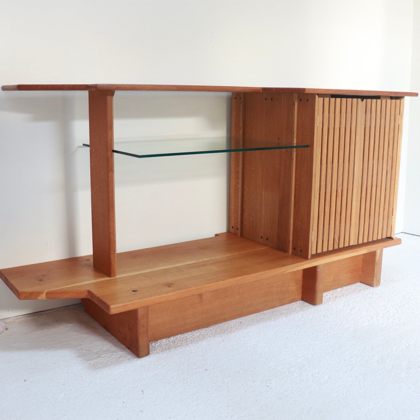 Modernist oak sideboard with exposed joinery and sculptural form