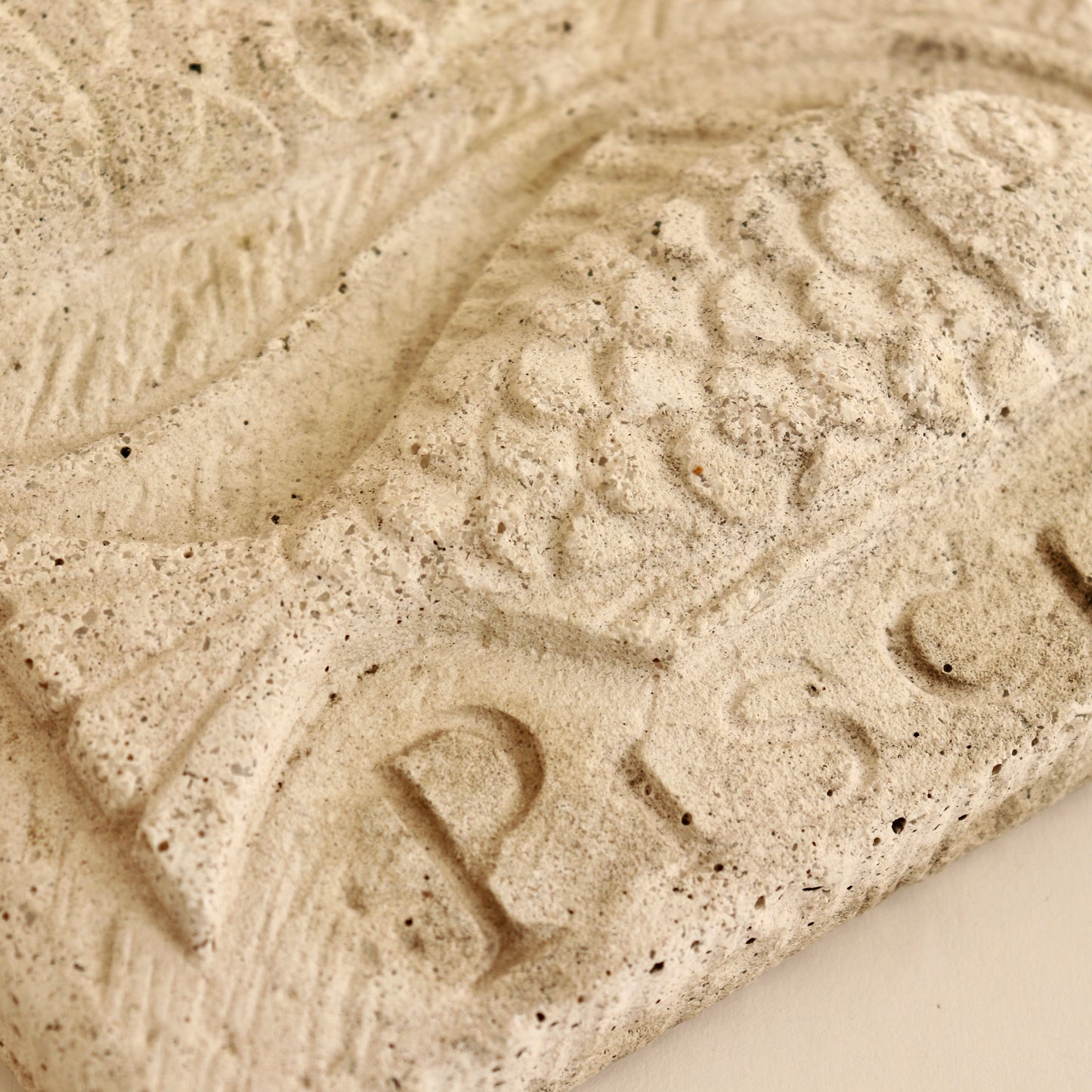 mid century decorative stone relief fish