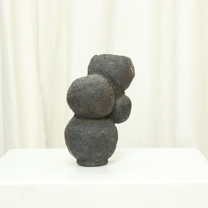 Side view of multi-lobed organic studio pottery vase