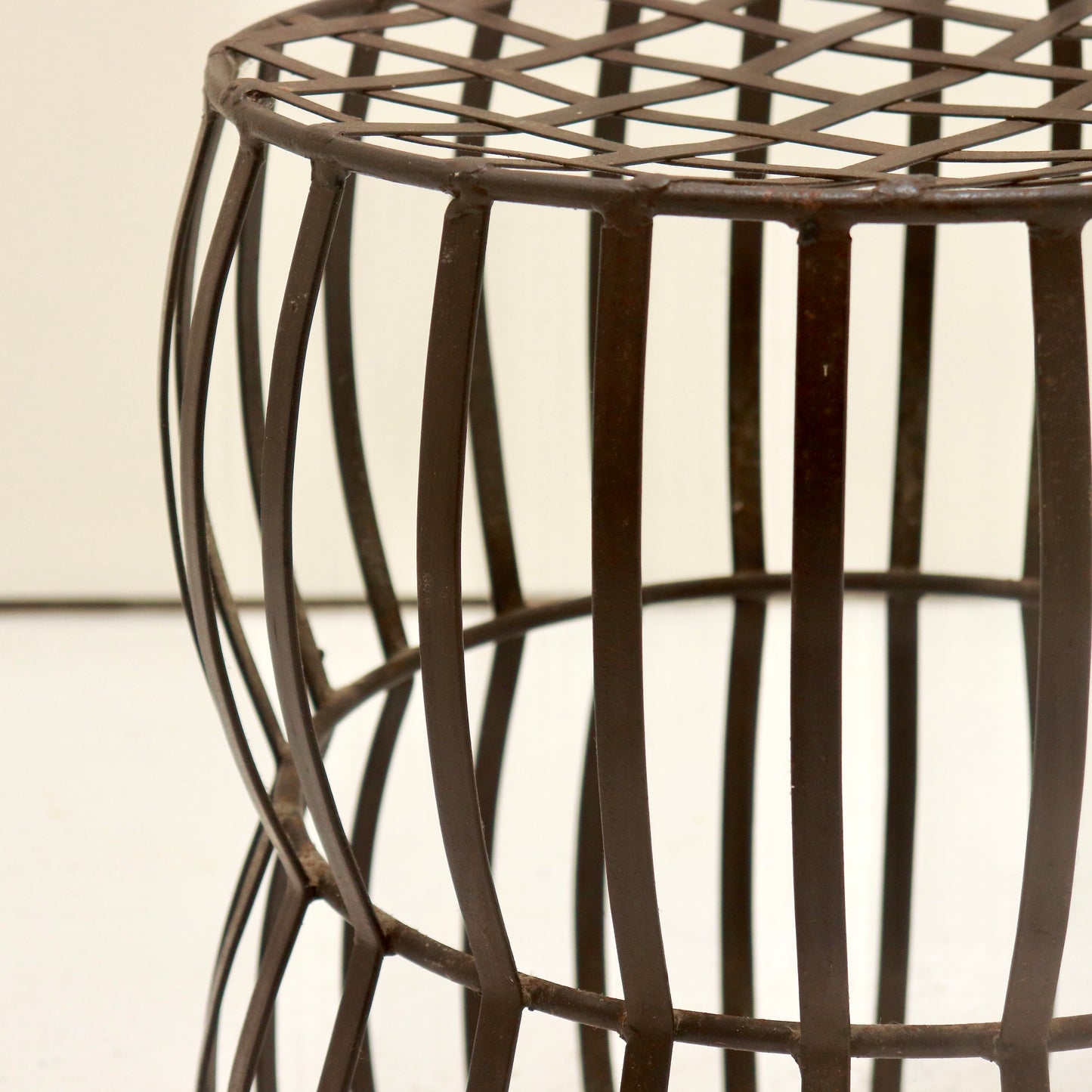 Detail of hand-forged strap joint with visible hammer marks.