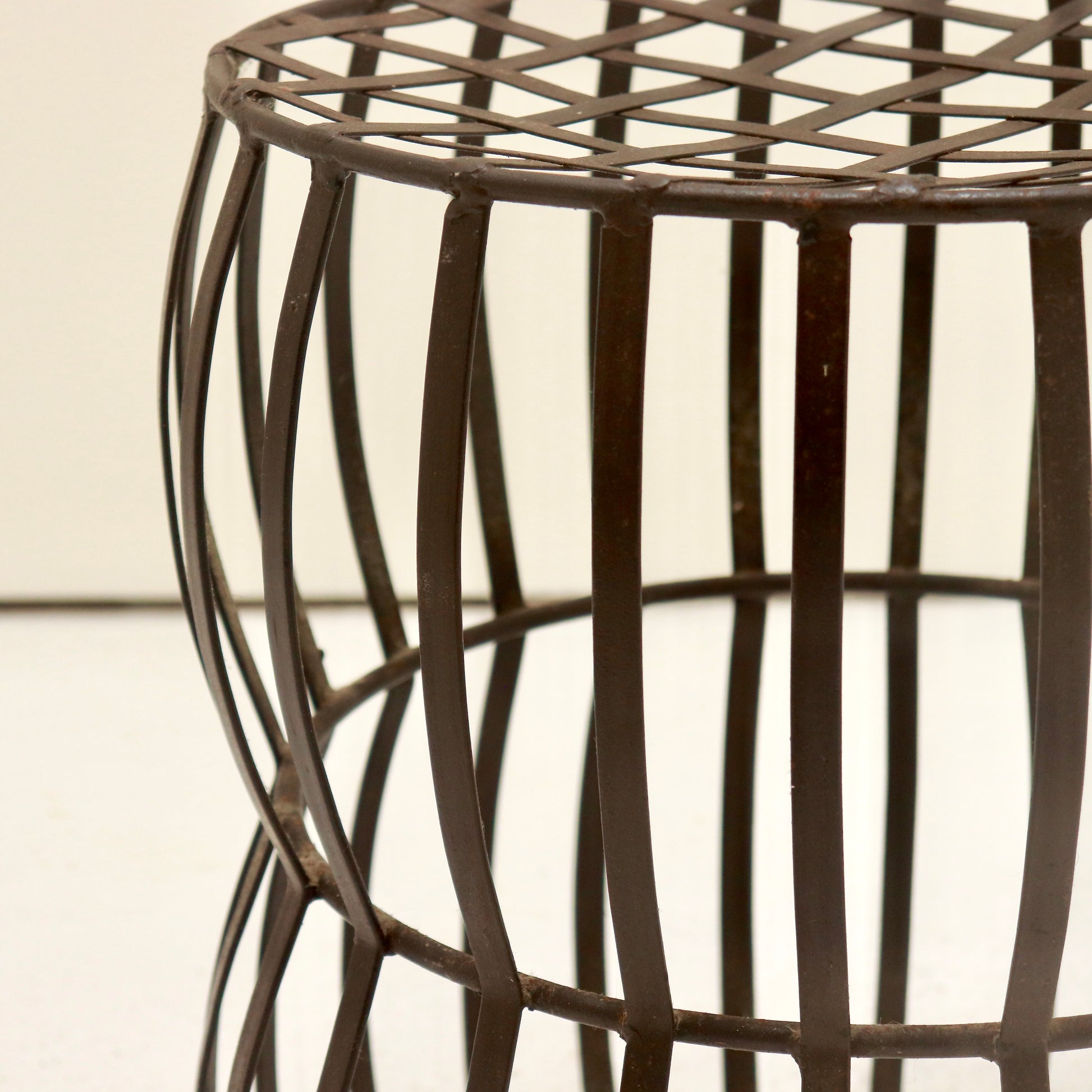 Detail of hand-forged strap joint with visible hammer marks.